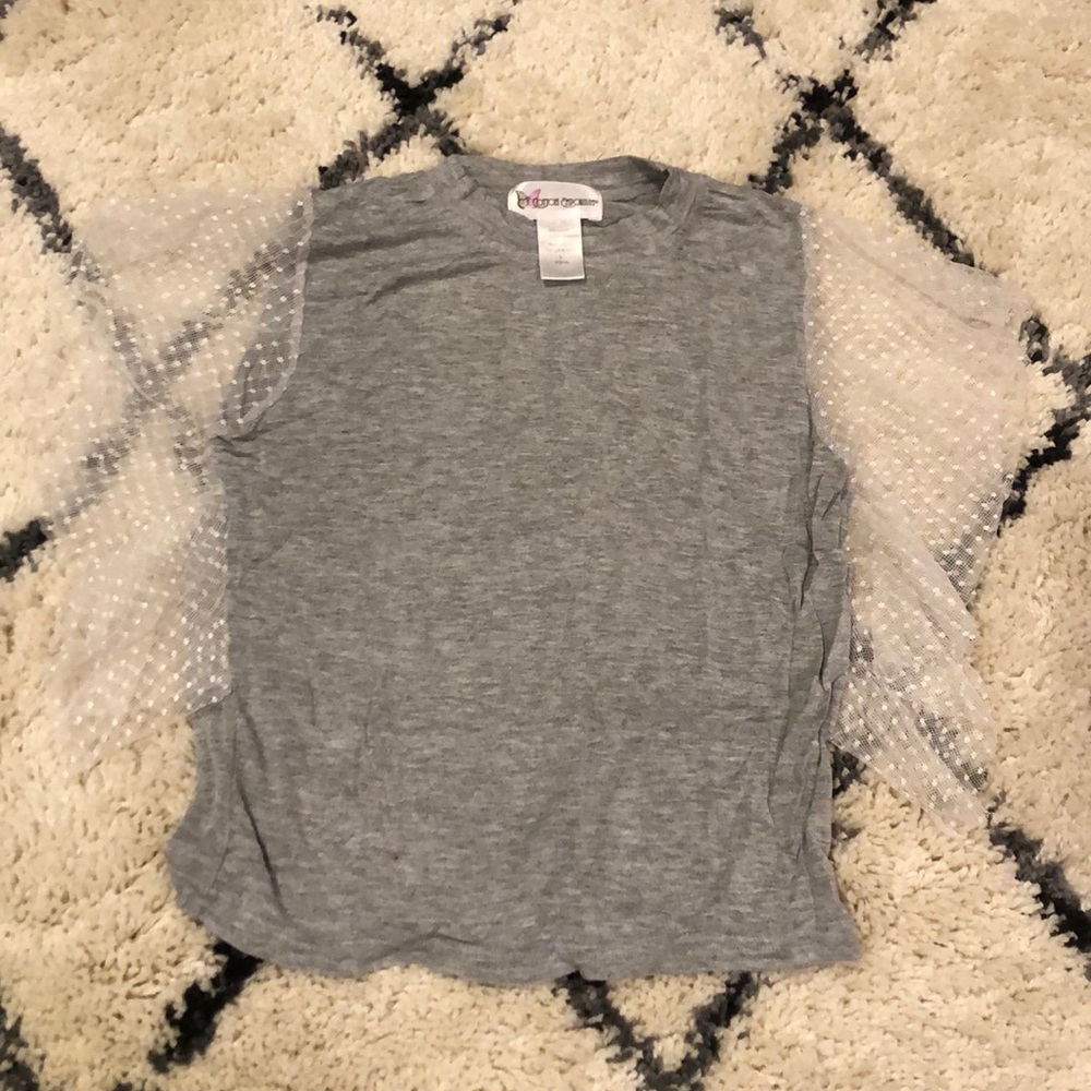 Grey t shirt with lace sleeves.